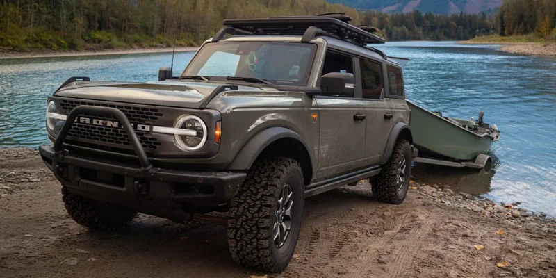 Ford SUV tracking across Wyoming scenery