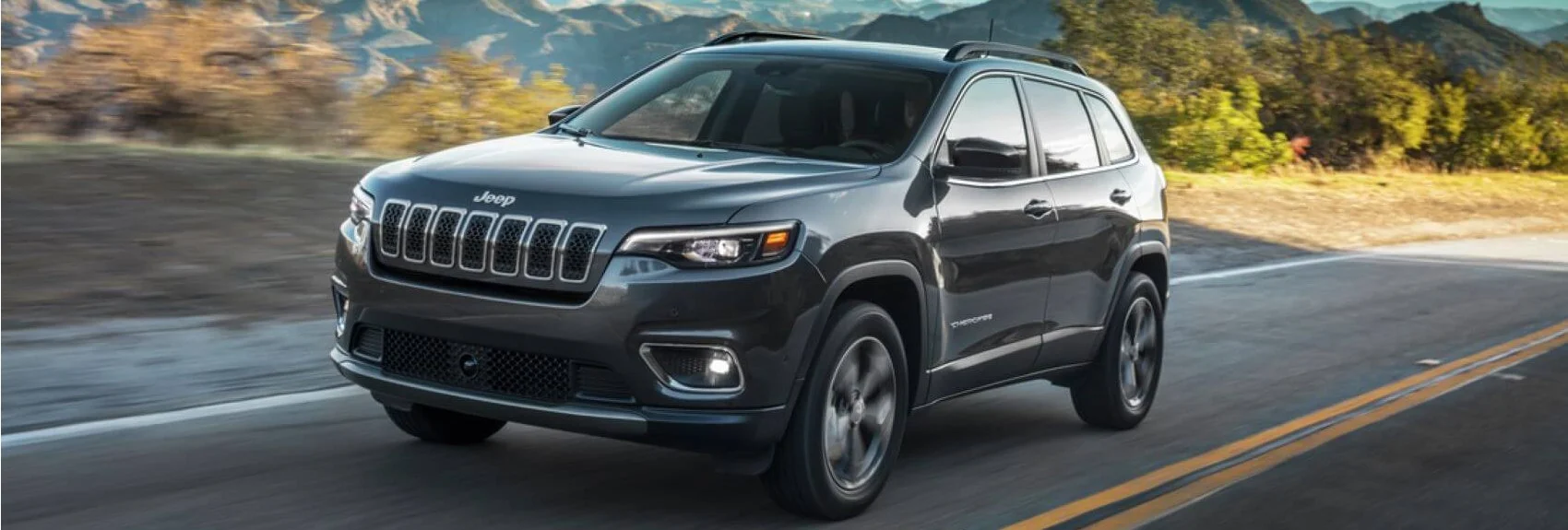 Jeep Cherokee Gray on Road Snipped