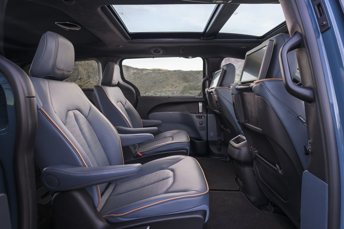 2027 Chrysler Pacifica Pinnacle second-row cabin with Blue Agave quilted Nappa leather captain's chairs and dual-pane panoramic sunroof